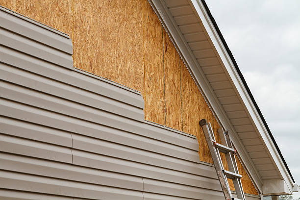 Professional Siding Installation technician working in Luthersburg, PA
